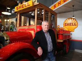 Ron Carey stand alongside a 1926 Shell Tanker. Carey said the area where the tanker is kept is one of his favourite spots in the museum. Directly behind the ‘light fuel delivery truck’ is a faux storefront that houses dozens of smaller Shell automotive artifacts including a Shell gas station sign that he said “in that kind of condition would go for $2,000-$3,000.” Olivia Condon/ Calgary Herald/ Postmedia Network