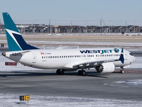 A WestJet Boeing 737 MAX 8 at Calgary International Airport. The Boeing aircraft was grounded in April 2019 and WestJet does not expect to use the planes before June 24.