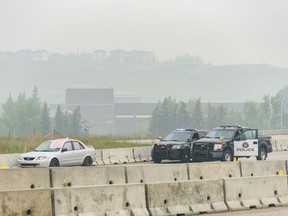 Police are investigating reports of a sudden death this morning on Stoney Trail bridge over Bow River. Photo by Azin Ghaffari/Postmedia Calgary