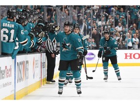 SAN JOSE, CA - APRIL 26:  Gustav Nyquist #14 of the San Jose Sharks is congratulated by teammates after he scored a goal against the Colorado Avalanche during the first period in Game One of the Western Conference Second Round during the 2019 NHL Stanley Cup Playoffs at SAP Center on April 26, 2019 in San Jose, California.
