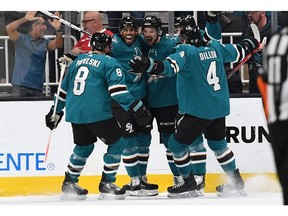 Joe Pavelski, Tomas Hertl, Evander Kane, Brenden Dillon and Erik Karlsson of the San Jose Sharks celebrate after Hertl scored a goal against the Colorado Avalanche during the first period in Game 7 of the Western Conference Second Round during the 2019 NHL Stanley Cup Playoffs at SAP Center on Wednesday in San Jose.