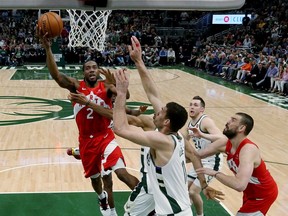 Kawhi Leonard #2 of the Toronto Raptors attempts a shot in the fourth quarter against the Milwaukee Bucks during Game Five of the Eastern Conference Finals of the 2019 NBA Playoffs at the Fiserv Forum on May 23, 2019 in Milwaukee, Wisconsin.