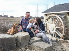 Trevor and Vicki Jacobs with Marshall, 1, and Ella, 6 weeks, fell in love with their new home in Artesia and can't wait to create memories in their new home.