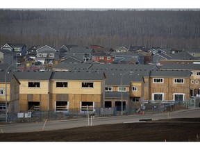 The Hillview Park condominium complex (foreground), in Fort McMurray Tuesday April 2, 2019. The 214-unit complex was destroyed in the 2016 wildfire and the rebuild has stalled. Photo by David Bloom/Postmedia.