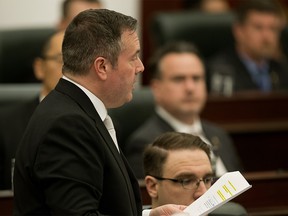 Premier Jason Kenney introduces Bill 1 during the first session of the 30th Alberta Legislature, in Edmonton Wednesday May 22, 2019. Photo by David Bloom