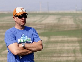 Matt Sawyer is seen on his grain and oilseed farm northeast of Calgary. Sawyer says he has been struggling with serve drought, wild weather and global trade barriers.