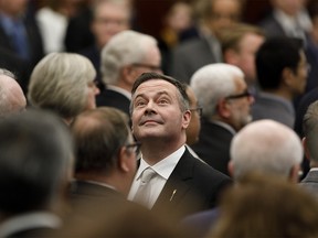 Alberta Premier Jason Kenney looks to the gallery after the speech from the throne was delivered in Edmonton on Wednesday.