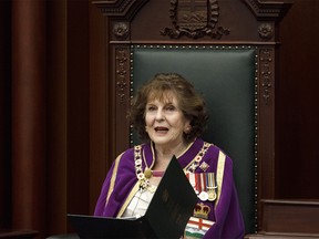 Lieutenant Governor of Alberta Lois Mitchell delivers the speech from the throne in Edmonton Alta, on Tuesday May 21, 2019. The new Alberta government has set its first legislature sitting in motion with a throne speech followed immediately by a bill to repeal the provincial carbon tax. THE CANADIAN PRESS/Jason Franson ORG XMIT: EDM105