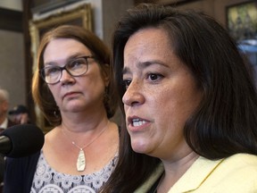Independent Members of Parliament Jane Philpott and Jody Wilson-Raybould speak with the media before Question Period in the Foyer of the House of Commons in Ottawa, Wednesday April 3, 2019.