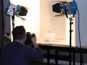 Tyler Heaton, an MFA new media candidate, captures images that will be processed to create a 3-D model at a workshop held last fall.