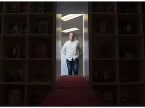 Author Anthony De Sa poses for a photograph after talking about his new book "Children of The Moon," in Toronto, Friday, April 26, 2019.