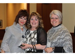 Pictured with reason to smile at the 10th annual UP and Away Charity Gala are, from left: Patricia Jones, CEO Catholic Family Service and UP Foundation; with Kim Schmaltz and Louise Dean School principal Helen Colbourne. The gala raised more than its goal of $350,000. Photos courtesy Sharon Olsen