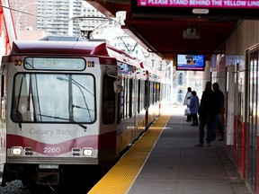 Commuters move through the Stampede/Victoria Park CTrain station on Thursday May 9, 2019. The station was the scene of a serious stabbing on Wednesday night.