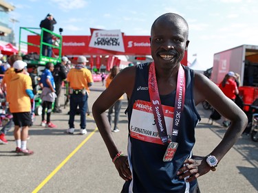 Jonathan Chesoo of Kenya smiles after winning the men’s division of the Scotiabank Calgary Marathon on Sunday May 26, 2019. Chesoo finished the race in 2:19:33.