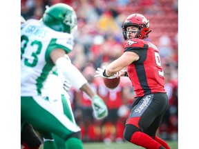 Calgary Stampeders quarterback Nick Arbuckle  looks to throw a pass against the Saskatchewan Roughriders during CFL pre-season football in Calgary on Friday, May 31, 2019. Al Charest/Postmedia
