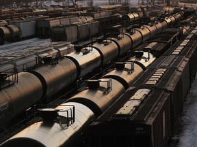 Rail cars wait for pickup in Winnipeg on March 23, 2014. The National Energy Board says crude-by-rail exports from Canada grew at a slower pace in November but still reached a new record high. It says a Canada exported 330,402 barrels per day of oil, up about one per cent from October's total of 327,229 bpd but more than double the 148,311 moved in November 2017.