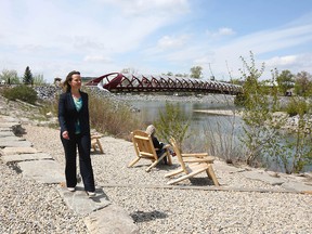 Sandy Davis, Flood Risk Awareness Program Manager, walks in the West Eau Claire area in downtown Calgary on Tuesday, May 14, 2019.