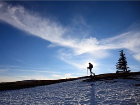Silhouette of hiker Dawn Penner on Moose Mountain. Courtesy, Andrew Penner