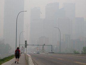 Looking into downtown Calgary from the Centre street as the city skyline fills with smoke from the wildfires burning in northern Alberta, the city registered a 10+ on the Air Quality Health Index, considered a very high risk.