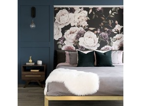 A striking design inset in the wall adds artistic flair to this master bedroom.