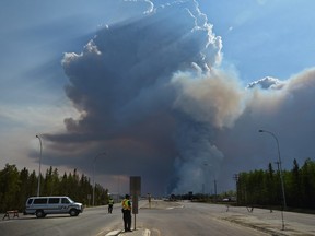 Wildfire crews conduct a controlled burn ignition operation on Wednesday May 22, 2019, approximately three kilometres southwest of High Level where about 4,000 residence were evacuated from the Chuckegg Creek fire.