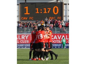 Cavalry FC players celebrate the team's goal early in the first half during Canadian Premier League Canadian Chamionship soccer action between Pacific FC and Cavalry FC at ATCO Field at Spruce Meadows in Calgary on Wednesday, May 22, 2019. The goal was ruled an own goal off of Julien Buscher's free kick. Jim Wells/Postmedia