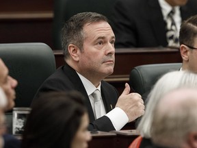 Alberta Premier Jason Kenney gives the thumbs up as the speech from the throne is delivered in Edmonton on Wednesday.