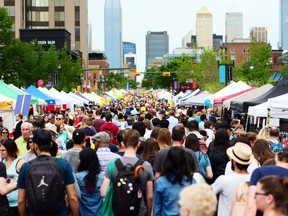 Thousands packed the streets at the fourth annual Lilac Festival in the community of Mission in Calgary, Alta., on June 4, 2017. Ryan McLeod/Postmedia Network