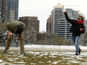 Visiting from Australia, Jordan and Jayden have a snowball fight in Prince's Island Park on Sunday, May 5, 2019.