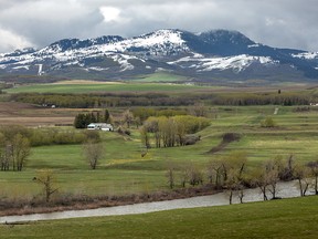 Looking west across the Castle River toward new snow above Beaver Mines on Wednesday, May 22, 2019. Mike Drew/Postmedia