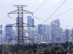 Power lines stretch toward downtown Calgary at Sarcee Trail and Bow Trail S.W.