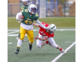 Team Nort's  David Lezama battles Team South's Tanner Winter during the Football Alberta 30th annual Senior Bowl at Hellard Field, Shouldice Athletic Park in Calgary on Monday, May 20, 2019. Darren Makowichuk/Postmedia