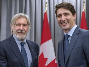 Prime Minister Justin Trudeau meets with actor Harrison Ford, Vice Chair of the Conservation International Board of Directors, at the Nature Champions Summit in Montreal on Thursday, April 25, 2019.