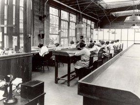 Radium Girls work in a U.S. Radium Corporation factory, circa 1922.