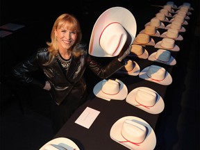 Tourism Calgary CEO Cindy Ady with the hats during the 57th annual Calgary White Hat Awards, a one-of-a-kind event that includes a red carpet, live awards and gala reception to celebrate inspiring Calgarians in the tourism industry who go above and beyond and strive to make their guests' experience a memorable one at the Jubilee Auditorium in Calgary on Wednesday, May 15, 2019. Darren Makowichuk/Postmedia