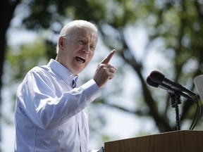 FILE - In this May 18, 2019, file photo, Democratic presidential candidate, former Vice President Joe Biden speaks during a campaign rally at Eakins Oval in Philadelphia. Rising disagreement among congressional Democrats over whether to pursue impeachment of President Donald Trump has had little effect on the party's presidential candidates, who mostly are avoiding calls to start such an inquiry.