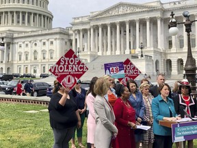 Sen. Amy Klobuchar, D-Minn., urges Senate to take up a bill renewing the Violence Against Women Act at a news conference Wednesday, May 22, 2019, outside the U.S. Capitol in Washington.