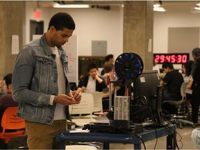 Wyatt Cole is one of the participants at the Neuro Nexus Health Hack Weekend at the Schulich School of Engineering. Cole is one of six team members building a project called the "Brainalyzer," which looks to detect levels of impairment.