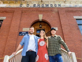 Co-owners Mike Wenzlawe, left, and Jamie Parker, right pose with Ali Sullivan-Lapp, director of operation, in front of Calgary Heritage Roasting Co.'s  flagship store in the historical Snowden building in Inglewood on Saturday, June 1, 2019. Azin Ghaffari/Postmedia Calgary