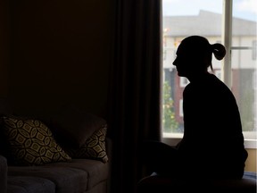 Anonymous attempted sexual violence victim, Lia (Alias), poses for a photo in her apartment in Calgary on Wednesday, June 26, 2019.