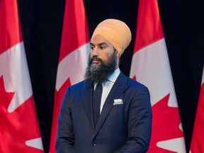 NDP leader Jagmeet Singh waits to light a candle for the menorah as the Canadian Society for Yad Vashem hosts the 2018 National Holocaust Remembrance Day Ceremony at the Canadian War Museum.