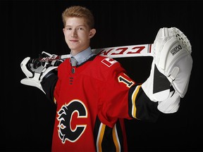 VANCOUVER, BRITISH COLUMBIA - JUNE 22: Dustin Wolf poses after being selected 214th overall by the Calgary Flames during the 2019 NHL Draft at Rogers Arena on June 22, 2019 in Vancouver, Canada. (Photo by Kevin Light/Getty Images)