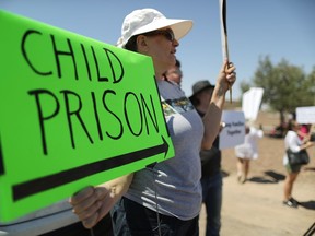 Protesters demonstrate in front of the U.S. Border Patrol facility where lawyers reported that detained migrant children were held unbathed and hungry on June 27, 2019 in Clint, Texas. The protesters attempted to deliver water and diapers to the facility but the front door was locked.