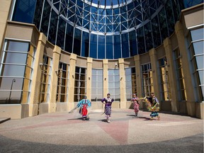 Dancers at the entrance to Blackfoot Crossing at Siksika Nation.