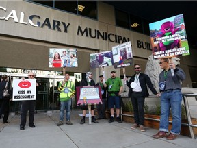 Hundreds of Calgary business owners rallied outside City Hall to protest huge hikes in business taxes on Monday morning June 10, 2019. Gavin Young/Postmedia