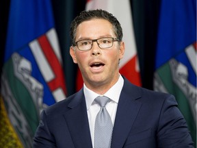 Justice Minister Doug Schweitzer announces the Alberta government's legal challenge of the federal carbon tax on Thursday, June 20, 2019, in Edmonton.