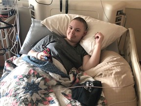 Carolyn Kelter, 16, is pictured in hospital as she undergoes treatment for adrenocortical carcinoma (ACC), a rare form of cancer that affects the adrenal glands that sit on top of each kidney. To raise funds for treatment, the Kelter family is hosting an fundraising dinner on June 28.