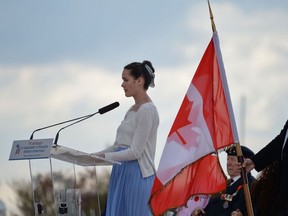 A Canadian teenager delivers a speech during an international ceremony on Juno Beach in Courseulles-sur-Mer, Normandy, northwestern France, on June 6, 2019, as part of D-Day commemorations marking the 75th anniversary of the World War II Allied landings in Normandy.