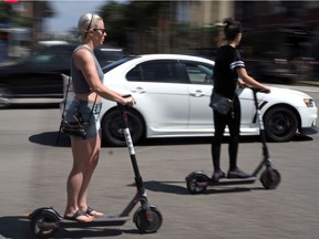 Shared electric scooters on the road in Santa Monica, California.