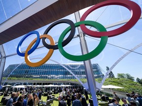 Guest visit and enjoy the garden of the Olympic house, the new International Olympic Committee (IOC) headquarters, after the inauguration ceremony in Lausanne, on June 23, 2019. (Photo by FABRICE COFFRINI / POOL / AFP)FABRICE COFFRINI/AFP/Getty Images